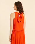 Top lazada y escote espalda coral