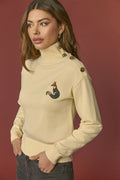 CHANCERY SWEATER | Jersey amarillo de cuello alto de Minueto