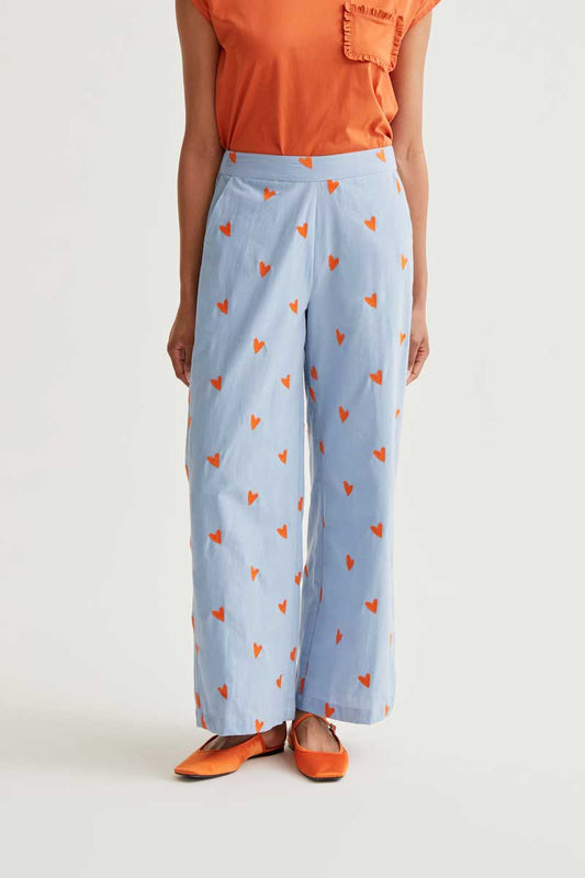 Pantalón estampado corazones naranja