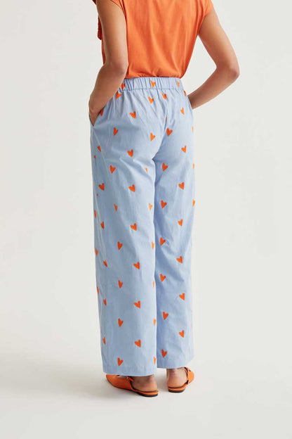 Pantalón estampado corazones naranja
