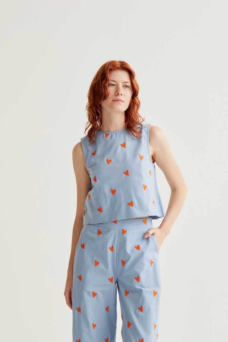 Top estampado corazones naranja