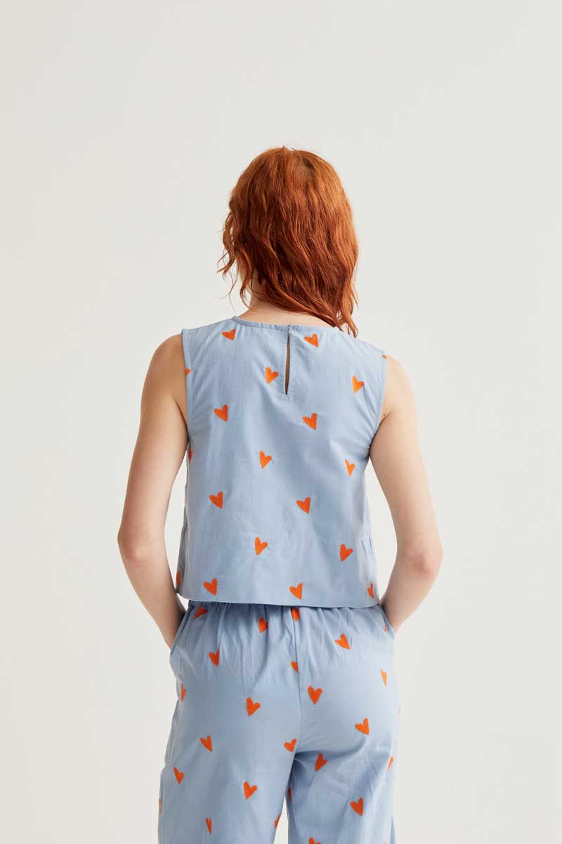 Top estampado corazones naranja