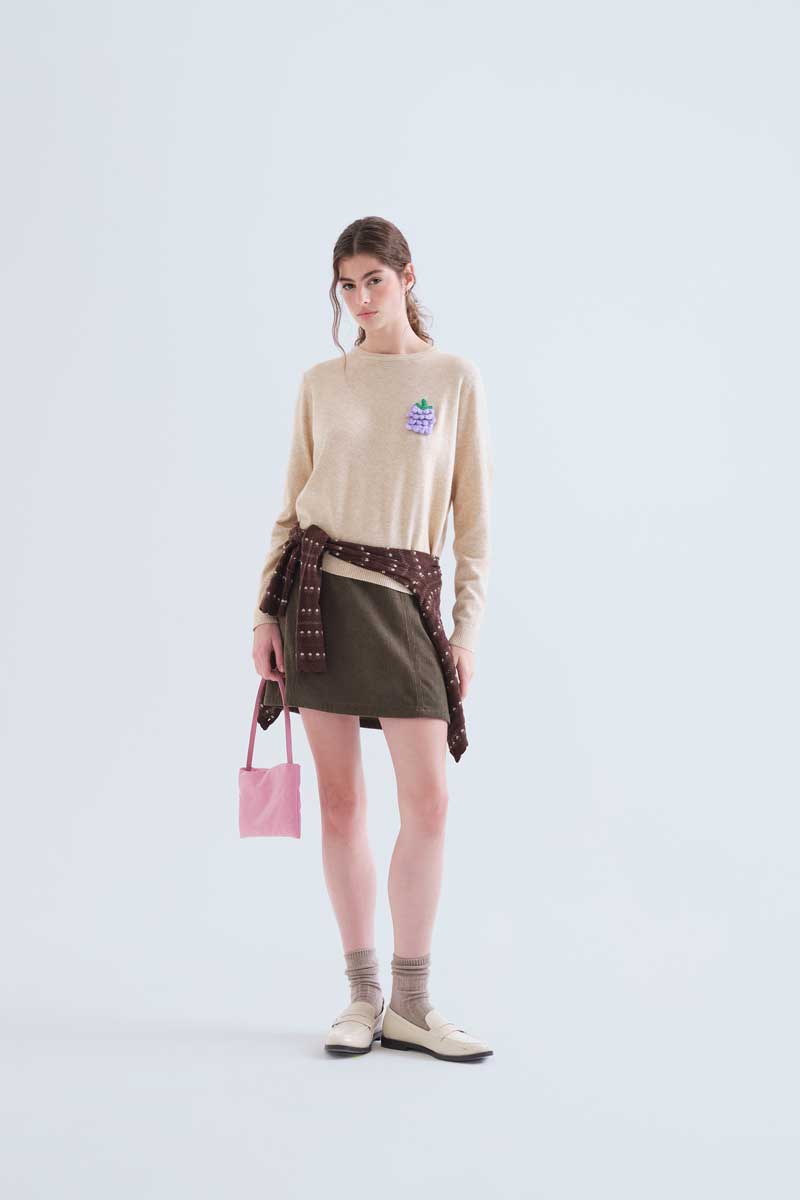 Jersey punto beige con detalle de uva