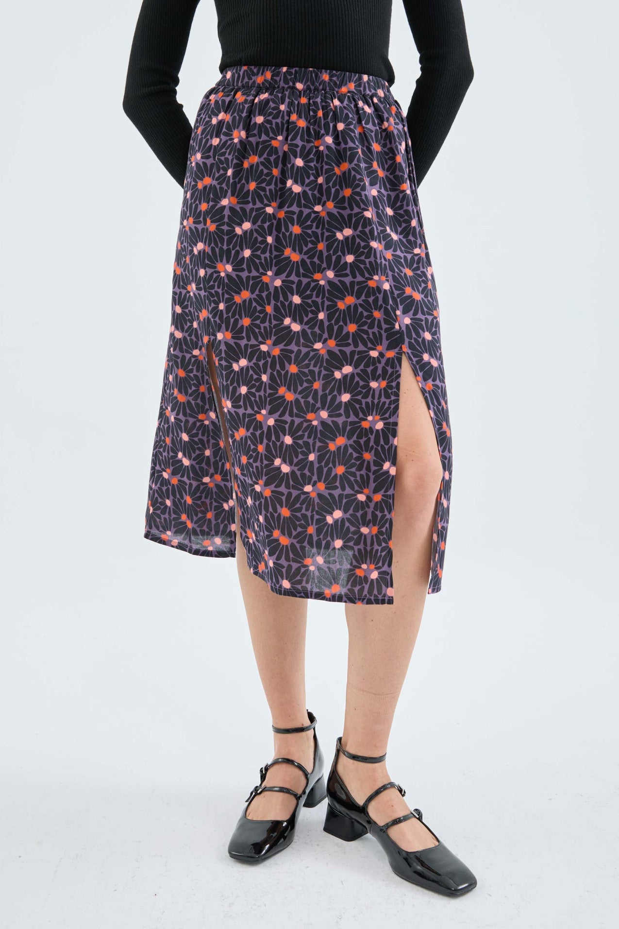 Falda_Midi_Con_Aberturas_Y_Estampado_Floral_Morado