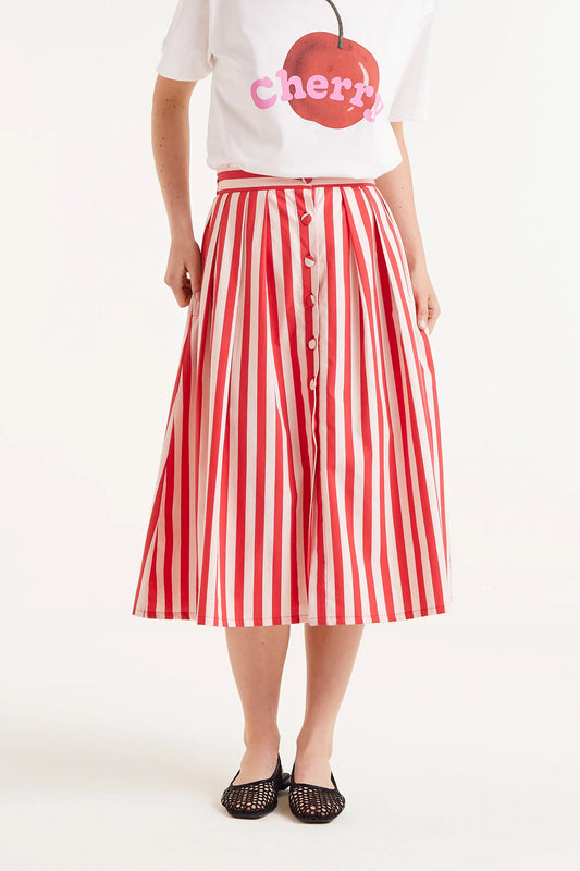 Falda Midi Estampado Rayas Rojas. Falda midi con rayas rojas y blancas, cierre frontal con botones y corte amplio.