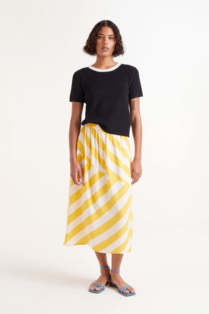 Falda Midi Rayas Amarillas. Falda midi con rayas amarillas y blancas, cintura elÃ¡stica y corte fluido.