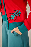 Conjunto de punto de dos piezas rojo y turquesa