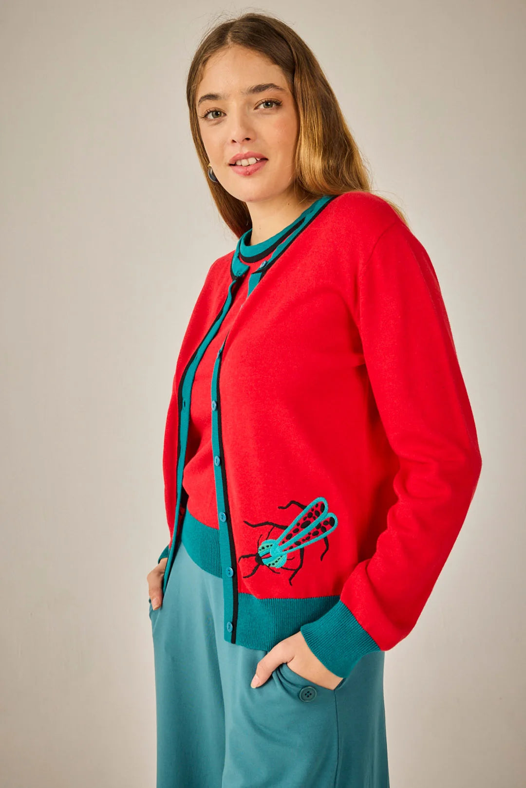 Conjunto de punto de dos piezas rojo y turquesa