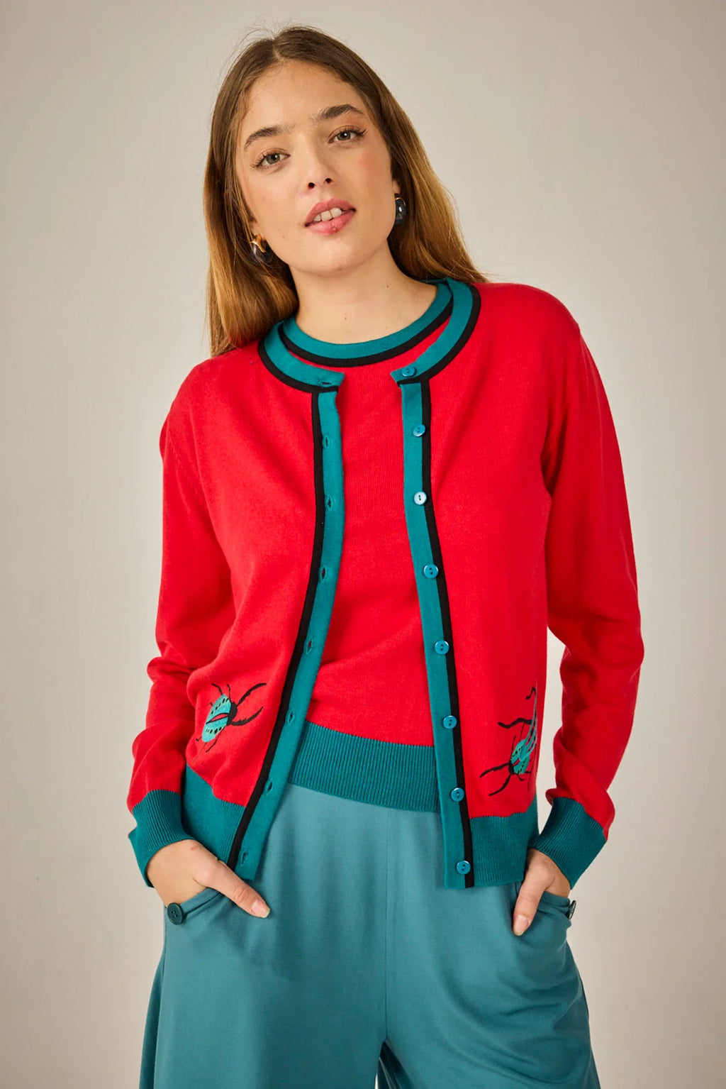 Conjunto de punto de dos piezas rojo y turquesa