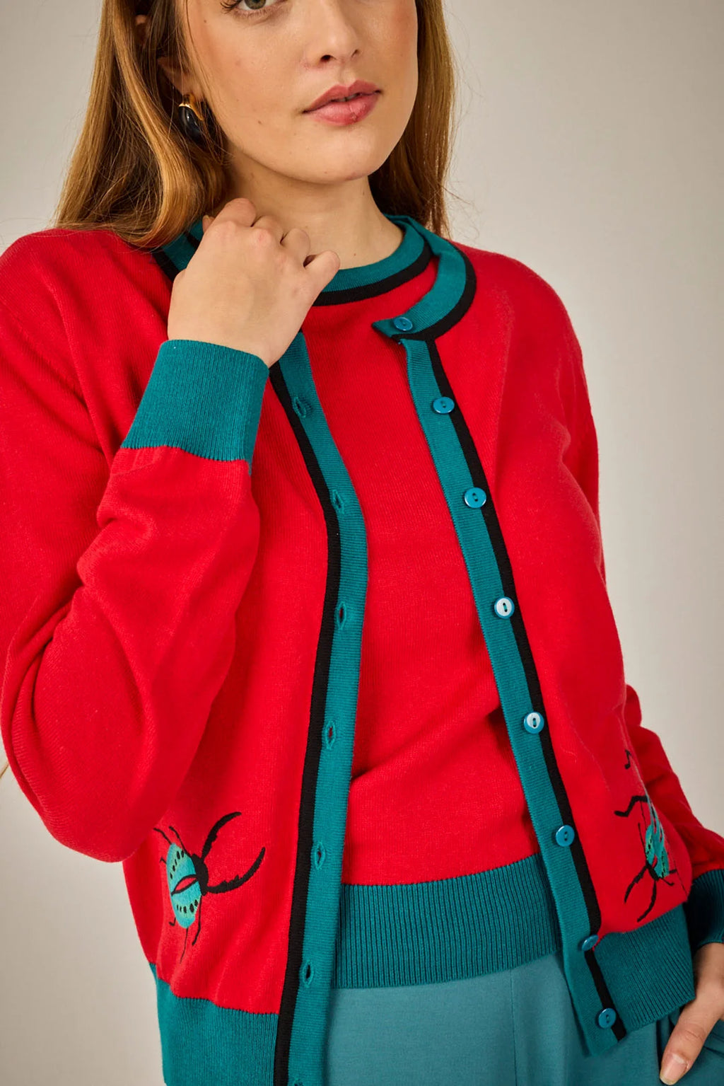 Conjunto de punto de dos piezas rojo y turquesa